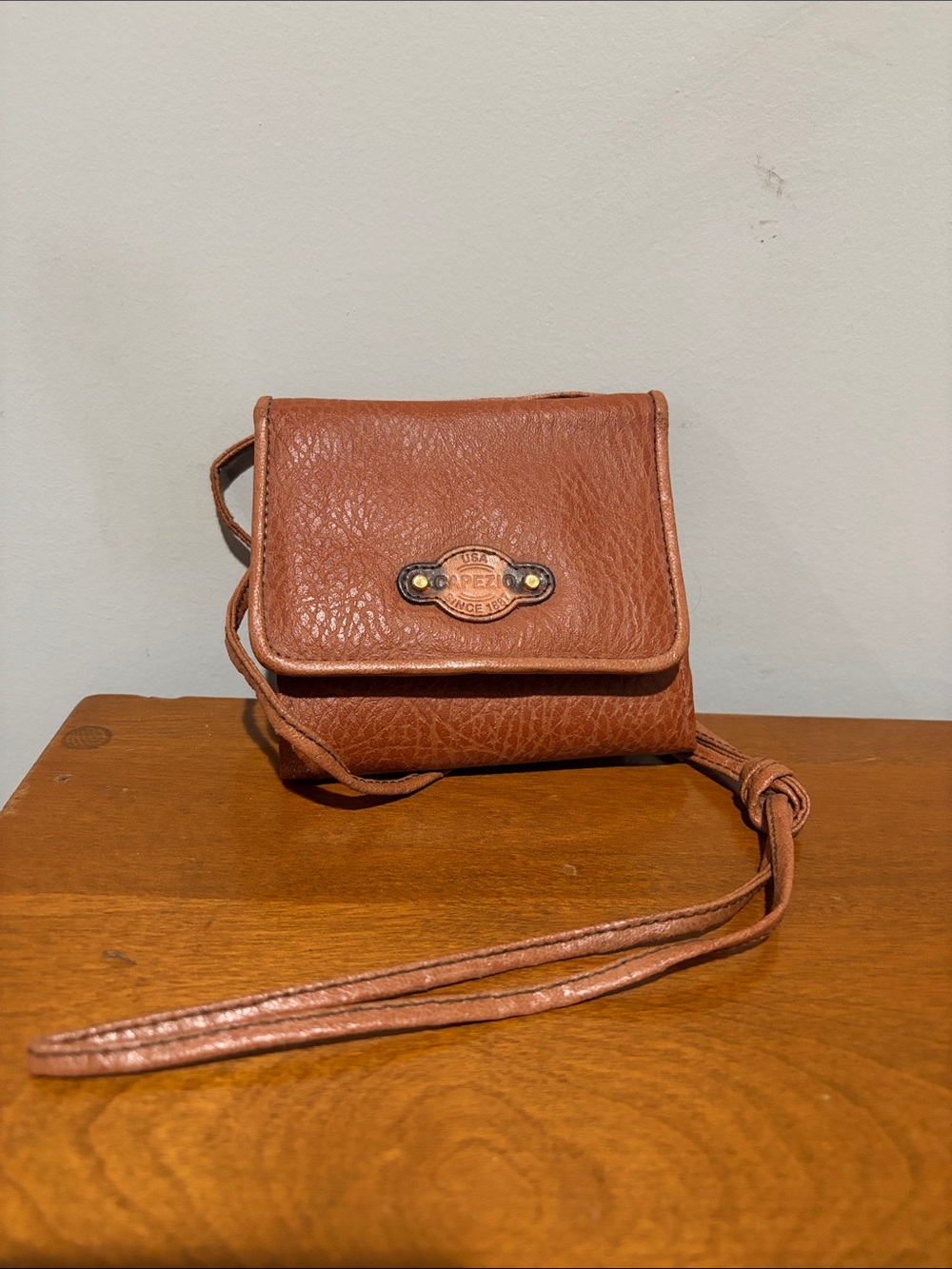 Capezio Brown Pebbled Leather Crossbody Wallet with Brass Logo Plaque